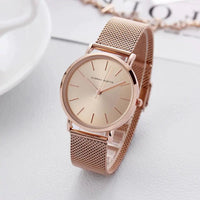 Rose gold stainless steel ladies' watch by MANDOTOS, featuring a sleek round face and elegant bracelet design.