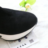 Mandotos round toe sports high heel over-the-knee boots shown in black with sleek design and chunky heel.