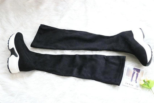 Mandotos round toe sports high heel over-the-knee boots in black with sleek design and chunky heel.