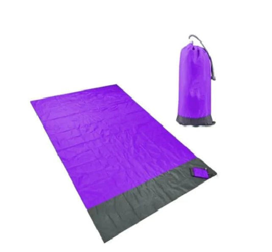 Mandotos sandproof portable beach mat with colorful striped design, lightweight and foldable for easy beach outings.