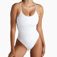 Mandotos Sculpting Beachwear Bodysuit in black, featuring a fitted design and seamless construction for a sleek summer look.