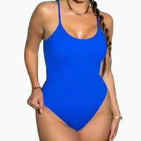 Mandotos Sculpting Beachwear Bodysuit displayed on a model, featuring a sleek, form-fitting design ideal for beach or swimwear fashion.