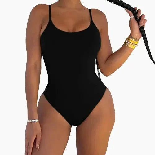 Mandotos sculpting beachwear bodysuit in black, featuring a fitted design and adjustable straps, ideal for swimwear or beach outings.