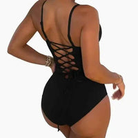 Mandotos Sculpting Beachwear Bodysuit featuring a seamless design and supportive fit for beach or poolside wear.