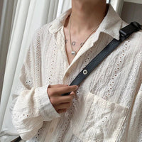 Mandotos men's apricot long-sleeved mesh shirt with lapel, hollow out design, stylish fashion for vacation or casual wear.