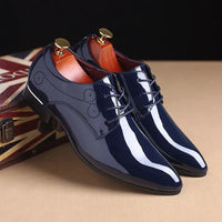 Mandotos sleek leather Oxford shoes with polished finish, classic lace-up design, and stylish craftsmanship.
