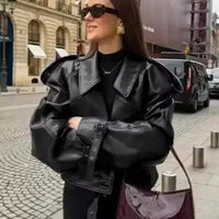 Mandotos sleek matte leather coat with a stylish design, featuring smooth leather texture and modern silhouette.