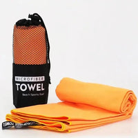 Mandotos Speedy Absorb Microfiber Towel spread out, showcasing its soft, lightweight, quick-drying fabric ideal for travel and sports.
