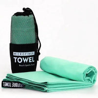 Mandotos Speedy Absorb Microfiber Towel with vibrant blue and gray design, lightweight and quick-drying for travel and sports use.