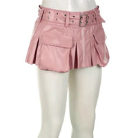 Mandotos Spice faux leather pleated mini skirt displayed on a hanger, showcasing its stylish design and pleated detail.