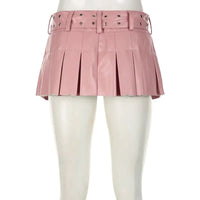 Mandotos Spice faux leather pleated mini skirt with a high waist and stylish design, shown in the product image.
