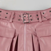 Mandotos Spice faux leather pleated mini skirt with a high waist and side zipper detail.