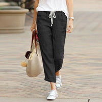 Light beige MANDOTOS Summer Elegance drawstring trousers with relaxed fit and casual style, perfect for warm weather.