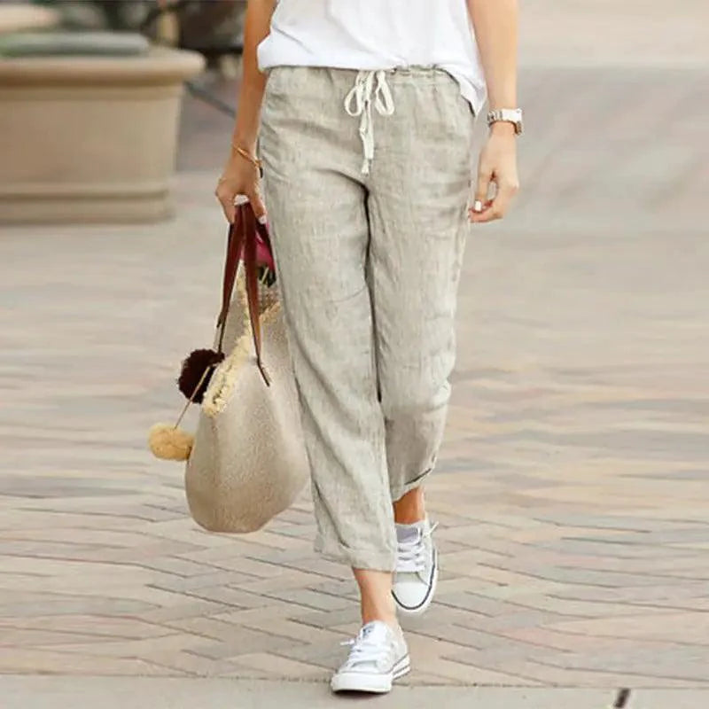 Mandotos Summer Elegance drawstring trousers in lightweight fabric, featuring a relaxed fit and stylish design for warm-weather wear.