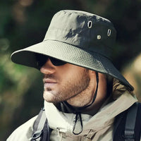 Mandotos sun-safe stylish bucket hat with wide brim, designed for outdoor protection and trendy summer wear.