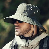 Mandotos sun-safe stylish bucket hat with wide brim and lightweight fabric, ideal for outdoor sun protection.