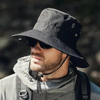 Mandotos sun-safe stylish bucket hat with wide brim, lightweight fabric, and adjustable chin strap for outdoor sun protection.