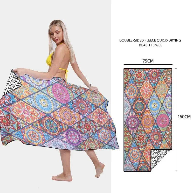 Mandotos SwiftDry patterned beach towel with colorful geometric design, soft fabric, perfect for sunbathing and beach days.