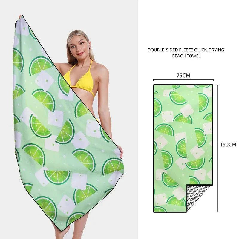 Mandotos SwiftDry patterned beach towel with vibrant geometric design, soft cotton material, perfect for seaside relaxation.