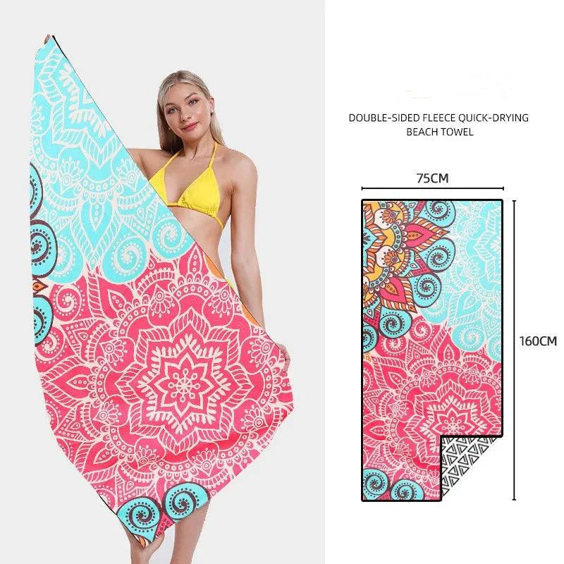 Mandotos SwiftDry patterned beach towel with vibrant geometric design, soft and lightweight for beach or poolside use.