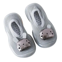 Mandotos toddler shoes in soft fabric with velcro straps, designed for comfort and easy wear for young children.