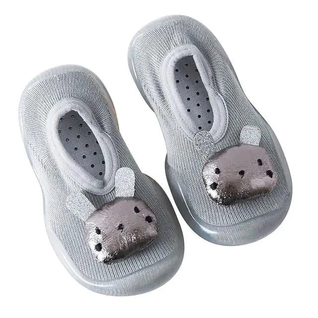 Mandotos toddler shoes in soft fabric with velcro straps, designed for comfort and easy wearing for young children.