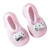 Mandotos toddler shoes in soft fabric with velcro straps, designed for comfort and easy wear for young children.