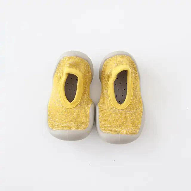 Mandotos toddler shoes featuring soft fabric and Velcro straps, designed for comfortable, easy wear for young children.