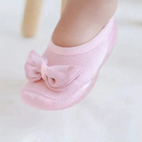 Mandotos toddler shoes in soft fabric with Velcro straps, designed for comfort and easy wear for young children.