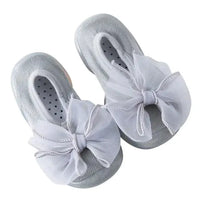 Mandotos toddler shoes in soft fabric with Velcro straps, designed for comfort and easy wear for young children.