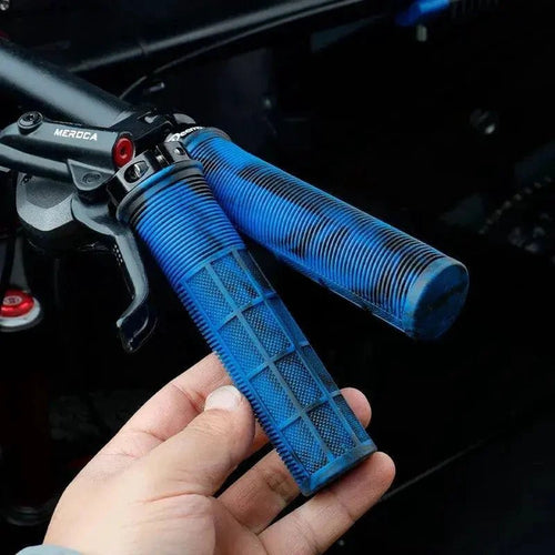 Mandotos TPR cyclist grips with textured surface for secure hold on bike handlebars.