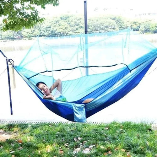 Mandotos Traveler's Mosquito-Free Hammock with net and durable fabric for outdoor camping and relaxing in nature.