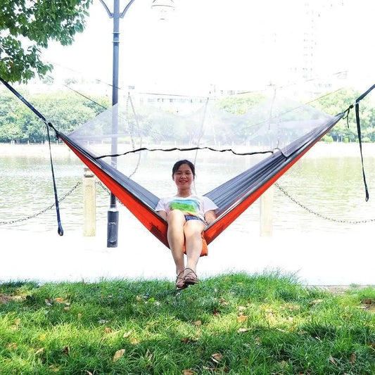 Mandotos Traveler's Mosquito-Free Hammock with breathable netting and durable fabric for outdoor relaxation.