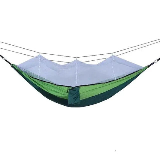 Mandotos Traveler's Mosquito-Free Hammock hanging outdoors with mesh sides and sturdy straps, ideal for camping and relaxing.