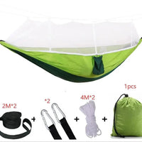 Mandotos Traveler's Mosquito-Free Hammock with integrated net, lightweight and portable for outdoor camping and relaxing.