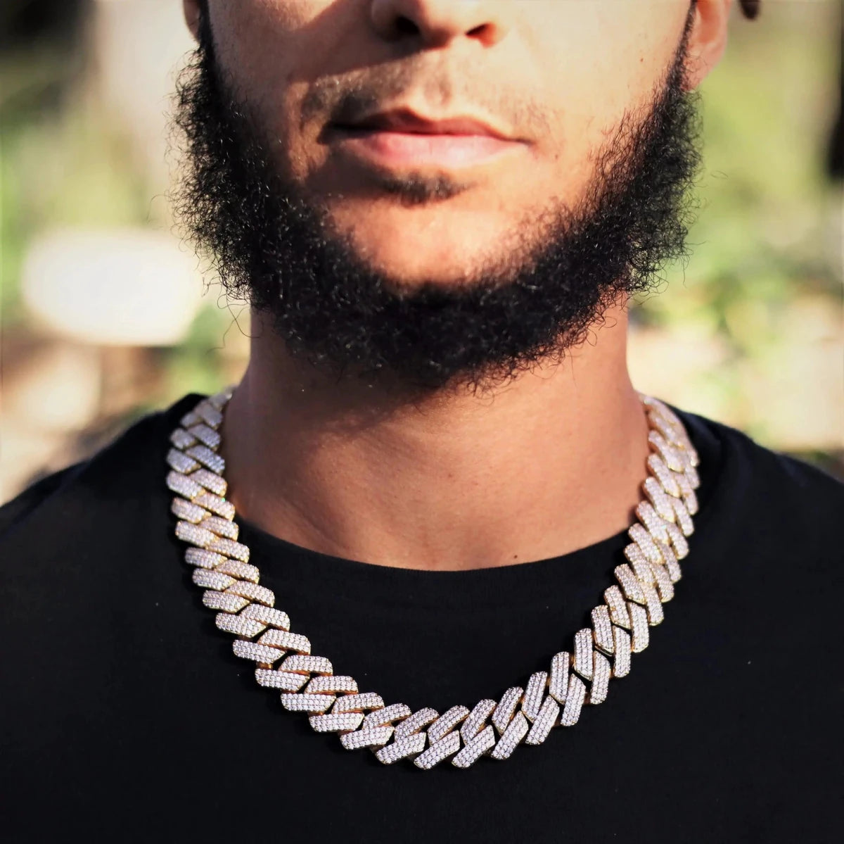 Mandotos triple row diamond gold Cuban chain featuring sparkling diamonds and a bold, stylish design.