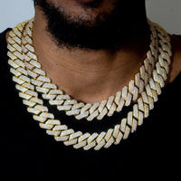 Mandotos triple row diamond gold Cuban chain featuring sparkling diamonds and a bold, luxurious gold link design.