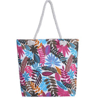 Twin-sided artistic canvas bag by MANDOTOS showing vibrant, colorful designs on both sides, with sturdy handles and spacious interior.