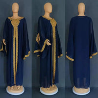 Mandotos two-piece gold kaftan abaya dress with flowing fabric and intricate detailing, perfect for elegant occasions.