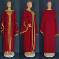 Mandotos two-piece gold kaftan abaya dress set with flowing fabric and elegant design, perfect for formal occasions.