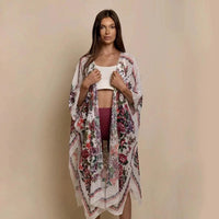 Mandotos Urban Blossom Kimono featuring floral pattern, lightweight fabric, and relaxed fit, perfect for casual or layered wear.