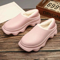 Mandotos warm outdoor shoes with insulated lining and rugged soles, designed for cold weather outdoor activities.