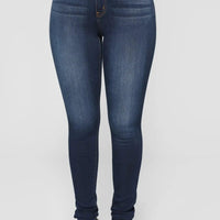 Mandotos women's high waist stretch denim skinny jeans with hip lift design, full length, solid color, slim fit, and bleach effect.