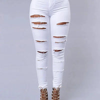 Mandotos women's high-waist stretch skinny ripped washed denim jeans, casual Y2K style with holes and tapered fit.
