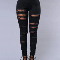 Mandotos women's high waist stretch skinny ripped denim jeans with washed finish, casual Y2K style, slim fit, and distressed details.