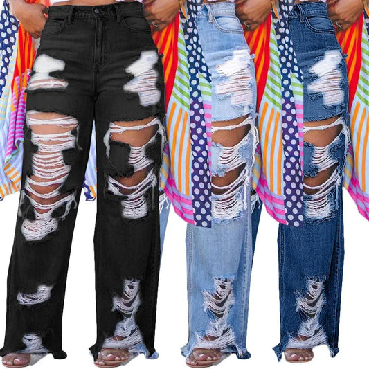 Mandotos burnt flower high waist jeans for women, casual denim trousers with trendy floral print, perfect for spring and summer wear.