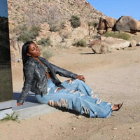 Mandotos women's slim fit high-waist denim jeans with splice design, button pockets, and straight-leg style for summer 2024.