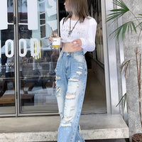 Plus size high waist straight-leg denim pants for women by MANDOTOS with American Hole design, plus size women's fashion.