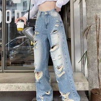 Plus size American Hole high waist straight-leg denim pants for women by MANDOTOS, showcasing the stylish distressed design and fit.
