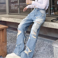 Plus size American Hole high waist straight-leg denim pants for women by MANDOTOS, showing front view with distressed details.
